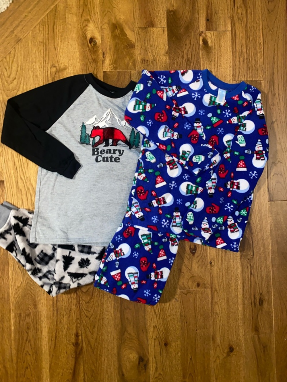 Two pairs of boys size 10-12 Christmas pajamas.